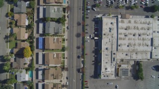 DCA05_161 - 4K aerial stock footage of a bird's eye of residential neighborhoods, reveal Fallbrook Center, West Hills, California