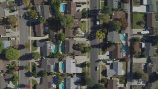 DCA05_163 - 4K stock footage aerial video of a bird's eye view over neighborhoods, church, Canoga Park, California
