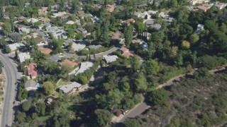 DCA06_001 - 4K aerial stock footage of flying by residential neighborhoods, Los Angeles, California