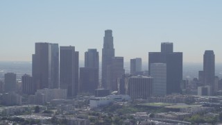 DCA06_005 - 4K aerial stock footage tilt from Echo Park Lake, revealing city skyline, Downtown Los Angeles, California