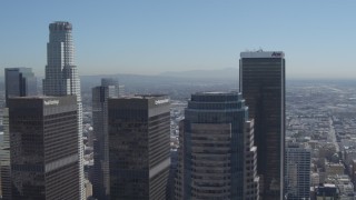 DCA06_009 - 4K aerial stock footage flyby city skyscrapers, focus on Aon Center, Downtown Los Angeles, California