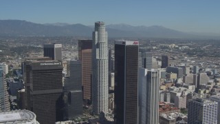 DCA06_015 - 4K aerial stock footage of orbiting tall city skyscrapers in Downtown Los Angeles, California