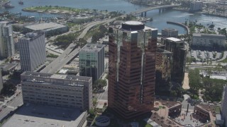 DCA06_020 - 4K aerial stock footage tilt from office building to reveal RMS Queen Mary, Downtown Long Beach, California