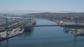 DCA06_045 - 4K aerial stock footage of approaching Vincent Thomas Bridge between Port of Los Angeles and San Pedro, California