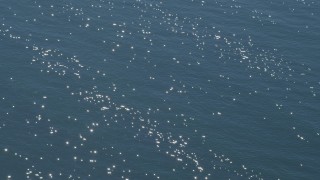 DCA06_058 - 4K aerial stock footage of shimmering Pacific Ocean, Southern California