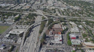 DCA06_065 - 4K stock footage aerial video tilt from light traffic to reveal freeway interchange, Mar Vista, California