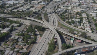 DCA06_066 - 4K stock footage aerial video tilt to bird's eye view of light traffic on freeway interchange, Mar Vista, California