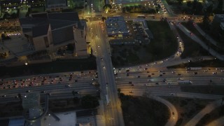 DCA07_028 - 4K aerial stock footage of Highway 101, tracking northbound traffic, Downtown Los Angeles, California, night