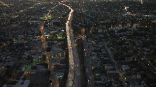 DCA07_029 - 4K aerial stock footage of flying over Highway 101 in Echo Park, California, night