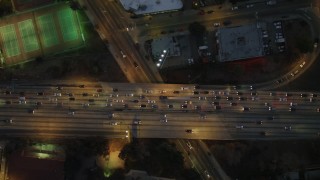 DCA07_031 - 4K aerial stock footage of a bird's eye view flying over Highway 101, Echo Park, California, night