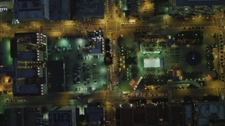 DCA07_040 - 4K aerial stock footage of bird's eye view following West 5th past Gas Company Tower, Downtown Los Angeles, California, night