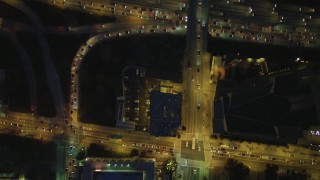 DCA07_044 - 4K aerial stock footage of bird's eye view following North Grand Avenue to Highway 101, Downtown Los Angeles, California, night