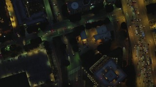 DCA07_045 - 4K aerial stock footage of bird's eye view flying between Highway 110 and North Figueroa, Downtown, Los Angeles, California, night