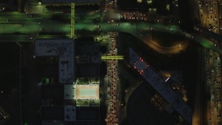 DCA07_047 - 4K aerial stock footage of bird's eye view following South Figueroa, Downtown, Los Angeles, California, night