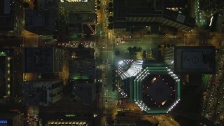 DCA07_049 - 4K aerial stock footage of bird's eye view following South Figueroa past Downtown skyscrapers, Los Angeles, California, night