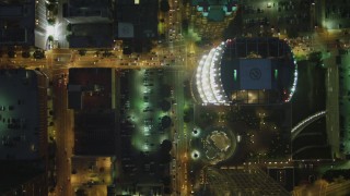 DCA07_050 - 4K aerial stock footage of bird's eye view following South Figueroa past skyscrapers, Downtown, Los Angeles, California, night