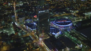 DCA07_057 - 4K stock footage aerial video of flying by The Ritz-Carlton, Nokia Theater, Staples Center, Downtown Los Angeles, California, night