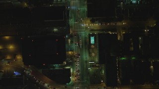 DCA07_068 - 4K aerial stock footage of following Wilshire Blvd from Irolo Street to South Harvard Blvd, Koreatown, Los Angeles, California, night