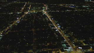 DCA07_080 - 4K aerial stock footage of flying by Beverly Center, Beverly Hills, California, night