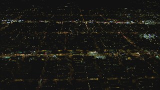 DCA07_082 - 4K aerial stock footage of flying over residential neighborhoods, West Hollywood, California, night