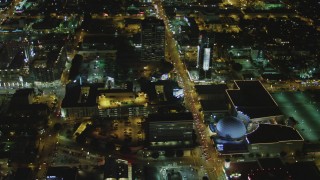 DCA07_084 - 4K stock footage aerial video of following Sunset Blvd past Cinerama Dome, to North Gower Street; Hollywood, California, night