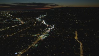 DCA07_091 - 4K aerial stock footage of approaching Sunset Blvd and Sunset Strip, West Hollywood, California, night
