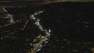 DCA07_092 - 4K aerial stock footage of following Sunset Blvd, approaching Sunset Strip, West Hollywood, California, night