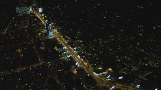 DCA07_096 - 4K aerial stock footage of flying by the Sunset Strip, West Hollywood, California, night