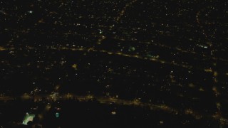 DCA07_104 - 4K aerial stock footage of approaching a residential neighborhood, Beverly Hills, California, night