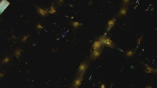 DCA07_105 - 4K aerial stock footage of a bird's eye view of residential neighborhoods, Beverly Hills, California, night