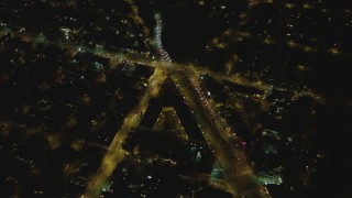 DCA07_107 - 4K aerial stock footage of the intersection of Santa Monica Blvd, North Doheny Dr, Melrose Ave, West Hollywood, California, night