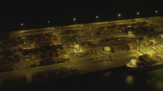 DCA07_143 - 4K stock footage aerial video of cargo containers at Port of Long Beach, California, night