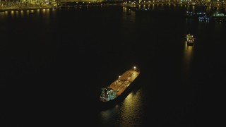 DCA07_146 - 4K stock footage aerial video of on oil tanker near Port of Long Beach, California, night