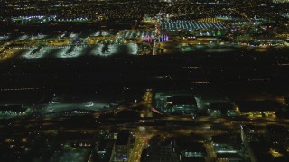 DCA07_165 - 4K aerial stock footage of tracking passenger jet taxiing, LAX (Los Angeles International Airport), Los Angeles, California, night