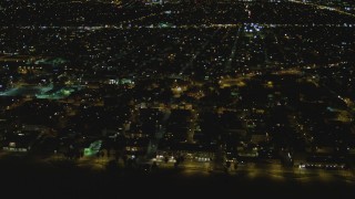 DCA07_169 - 4K aerial stock footage of flying by residential neighborhood, Venice, California, night