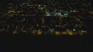 DCA07_170 - 4K aerial stock footage of flying by residential neighborhood, Venice, California, night