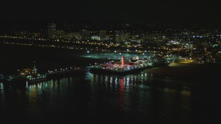 DCA07_172 - 4K stock footage aerial video of flying by the Santa Monica Pier, Santa Monica, California, night