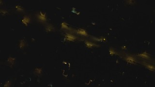 DCA07_185 - 4K aerial stock footage of a bird's eye view of a residential neighborhood, Woodland Hills, California, night