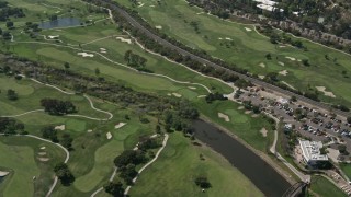 DCA08_005E - 4K aerial stock footage fly over golf course, Mission Valley, California