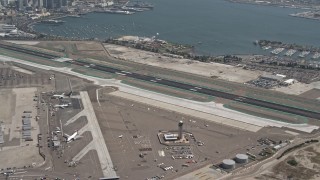 DCA08_009 - 4K aerial stock footage of panning across the San Diego International Airport, California