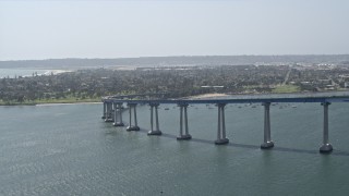 DCA08_023 - 4K stock footage aerial video of a reverse view of the Coronado Bridge in San Diego, California