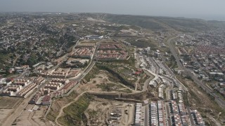 DCA08_043 - 4K aerial stock footage of urban residential neighborhoods in hills in Tijuana, Mexico