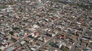 DCA08_045 - 4K aerial stock footage of dense urban neighborhoods in Tijuana, Mexico