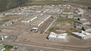 DCA08_105E - 4K stock footage aerial video orbit a prison complex in Otay Mesa, California