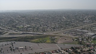 DCA08_123 - 4K aerial stock footage approach State Route 125 and suburbs, Spring Valley, California
