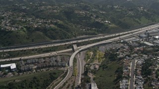 DCA08_137E - 4K aerial stock footage of light traffic on Interstate 8 in Grantville, California