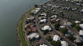 DCA08_144E - 4K aerial stock footage of a waterfront RV park, reveal a small marina in Fiesta Bay, Pacific Beach, California