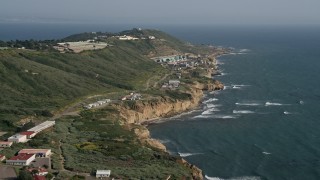 DCA08_164 - 4K aerial stock footage approach coastal cliffs and water treatment plant, Point Loma California