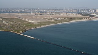 DCA08_169 - 4K aerial stock footage of an island military base, Naval Air Station North Island, California