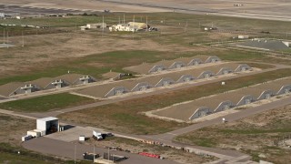 DCA08_171 - 4K aerial stock footage of bunkers at an island military base, Naval Air Station North Island, California